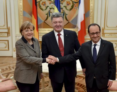 Меркель и Олланд везут в Москву согласованное в Киеве обновлённое минское соглашение