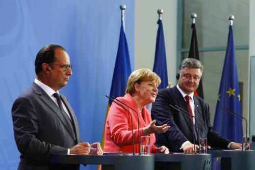 Меркель рассказала об итогах трехсторонних переговоров в Берлине