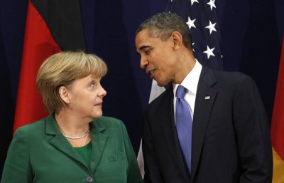 Обама и Меркель договорились продолжить финансировать Украину